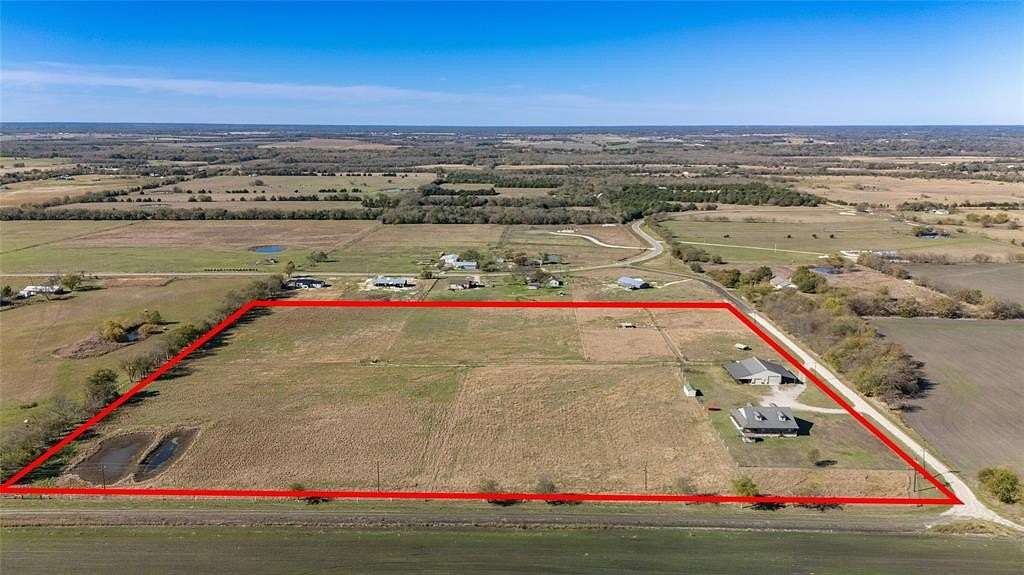 19.598 Acres of Land with Home for Sale in Wolfe City, Texas