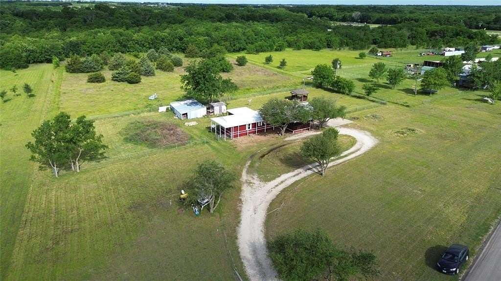 10 Acres of Land with Home for Sale in Caddo Mills, Texas