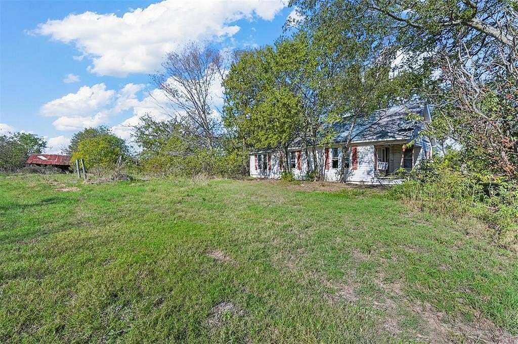 10.776 Acres of Land with Home for Sale in Corsicana, Texas