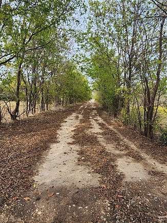 10.776 Acres of Land with Home for Sale in Corsicana, Texas