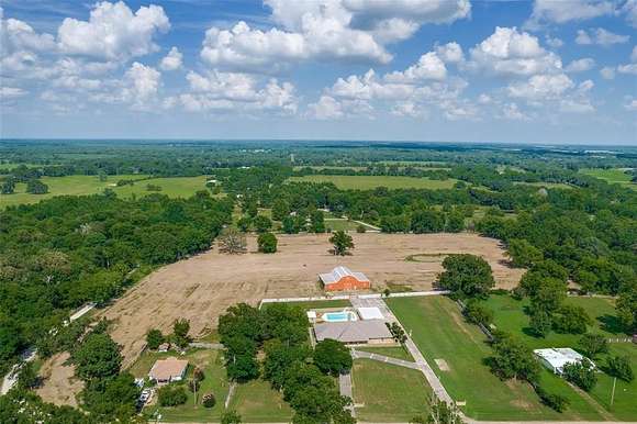 12.32 Acres of Land with Home for Sale in Bagwell, Texas