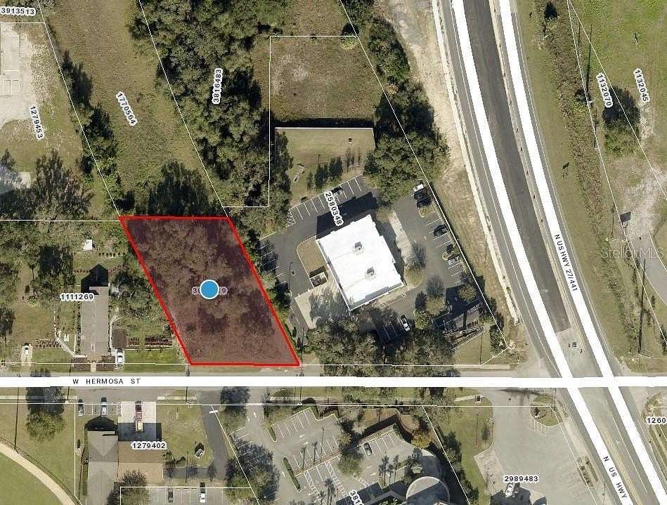 0.54 Acres of Commercial Land for Sale in Lady Lake, Florida