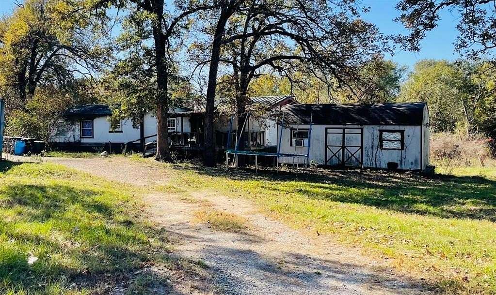 6 Acres of Residential Land with Home for Sale in Streetman, Texas