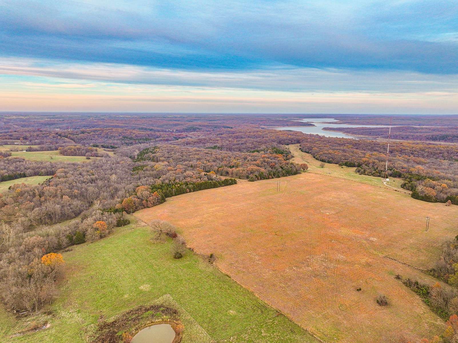 294 Acres of Recreational Land & Farm for Sale in Lowry City, Missouri