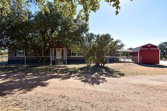 10.21 Acres of Recreational Land with Home for Sale in Brady, Texas