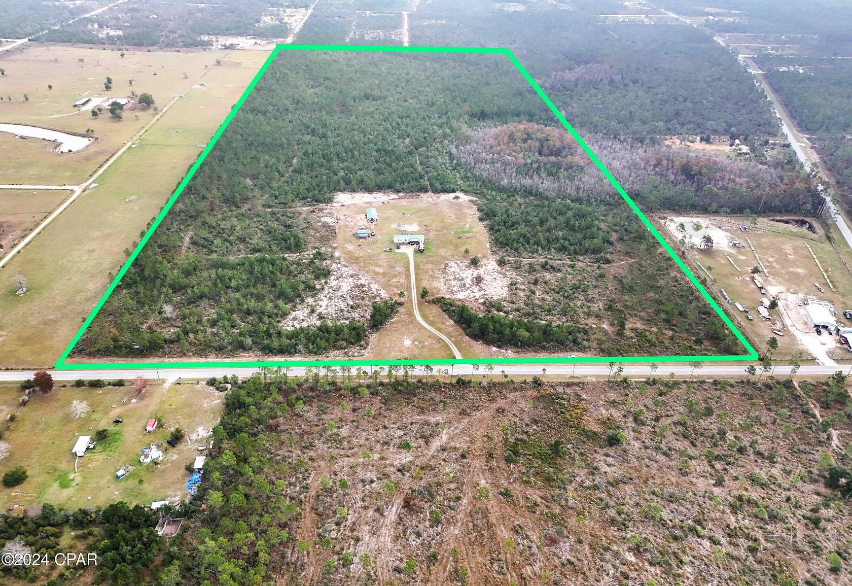 79.33 Acres of Land with Home for Sale in Fountain, Florida