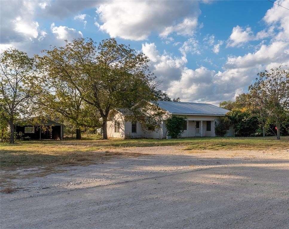 6.73 Acres of Residential Land with Home for Sale in May, Texas