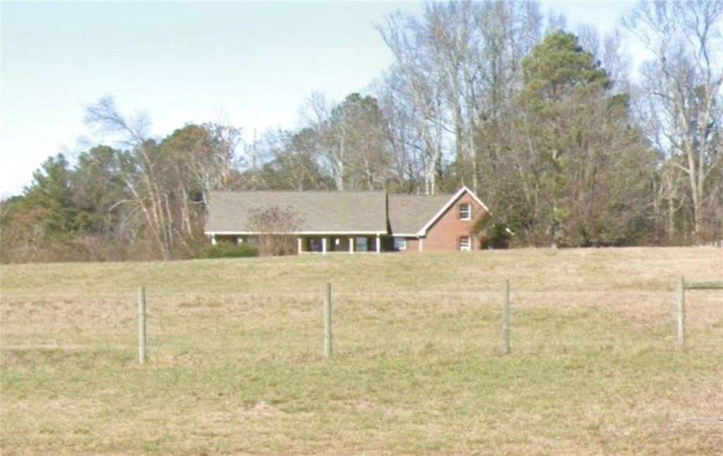 11.5 Acres of Land with Home for Sale in Loganville, Georgia