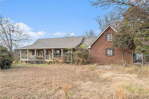 11.5 Acres of Land with Home for Sale in Loganville, Georgia