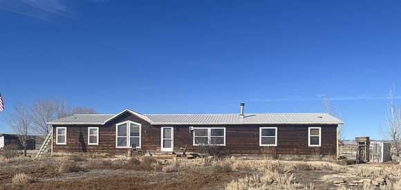 19.55 Acres of Land with Home for Sale in Loma, Colorado