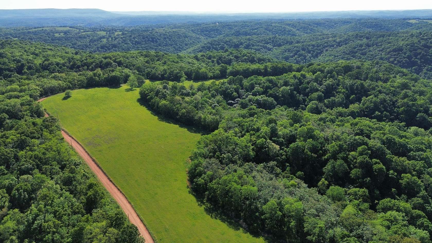 229 Acres of Land with Home for Sale in Mount Pleasant, Arkansas