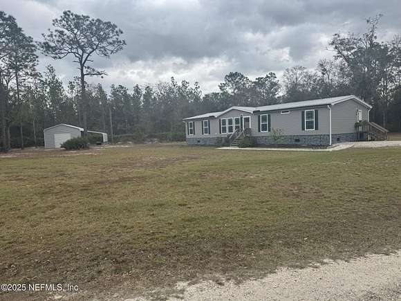 5.03 Acres of Residential Land with Home for Sale in Palatka, Florida