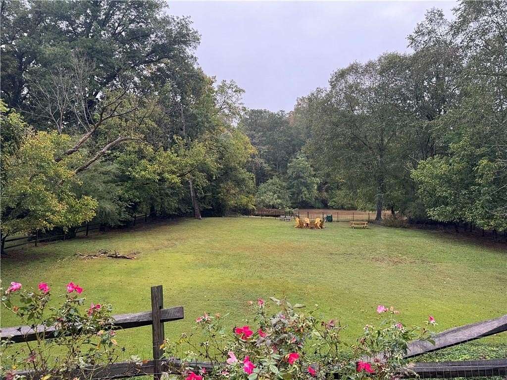 0.998 Acres of Residential Land with Home for Sale in Vinings, Georgia