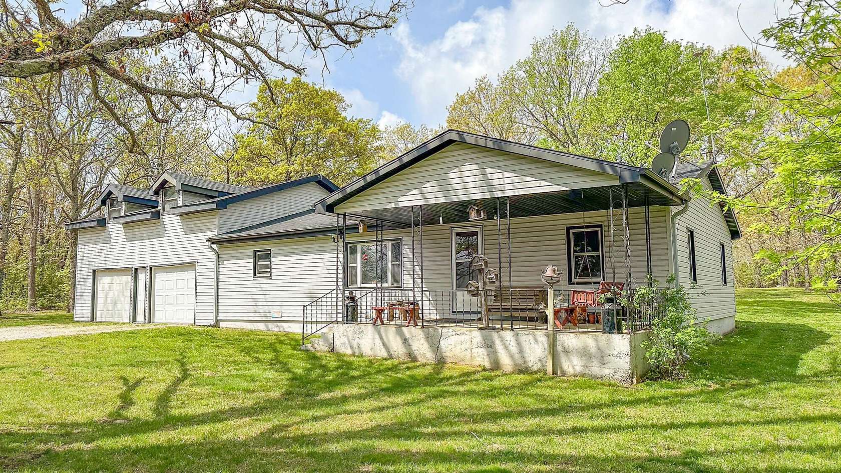 5 Acres of Residential Land with Home for Sale in Hartville, Missouri