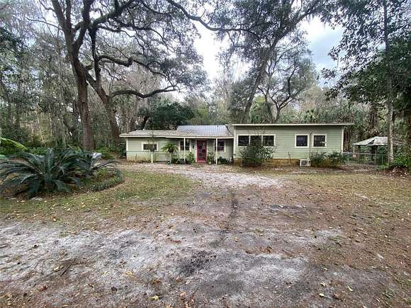 2.84 Acres of Residential Land with Home for Sale in Gainesville, Florida