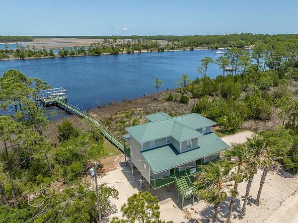 9.63 Acres of Residential Land with Home for Sale in Carrabelle, Florida