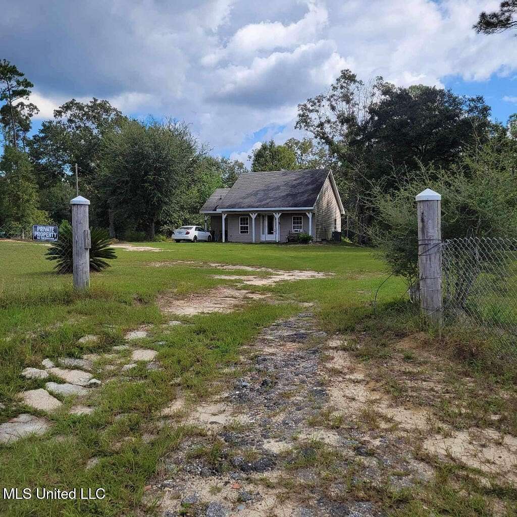 2.3 Acres of Residential Land with Home for Sale in Pass Christian, Mississippi