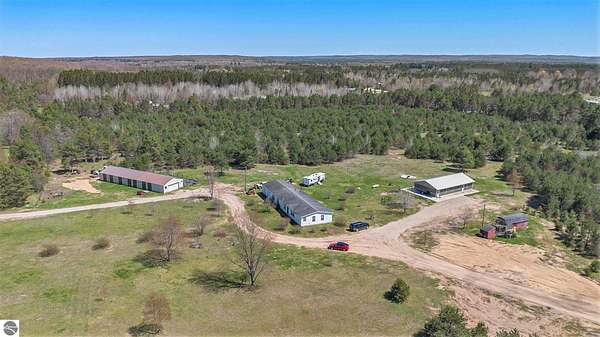 26 Acres of Land with Home for Sale in Fife Lake, Michigan