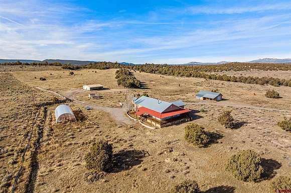 18.68 Acres of Land with Home for Sale in Los Ojos, New Mexico