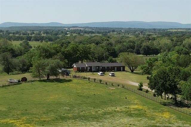 112.28 Acres of Agricultural Land with Home for Sale in Keota, Oklahoma