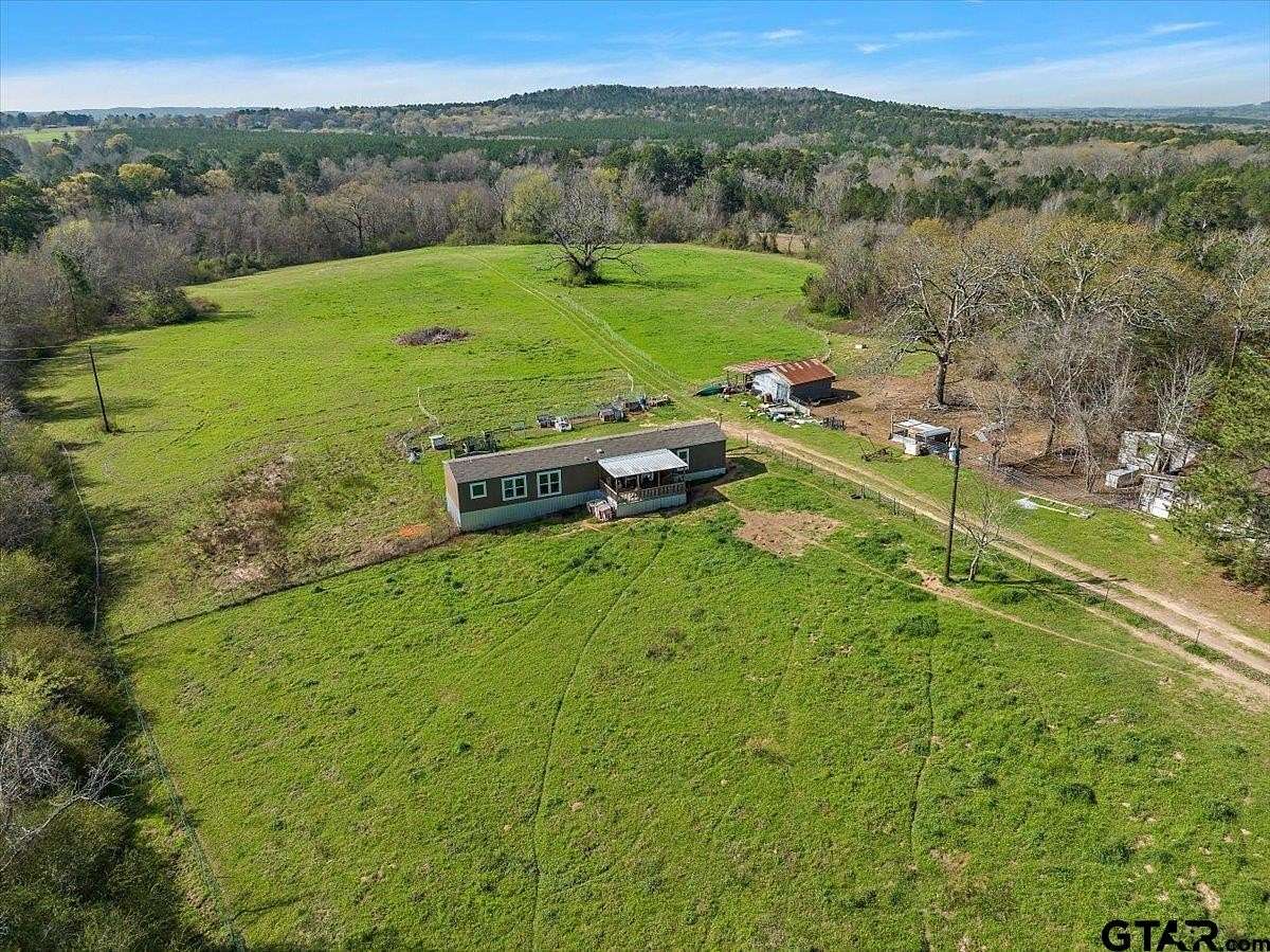 71.5 Acres of Agricultural Land with Home for Sale in Rusk, Texas