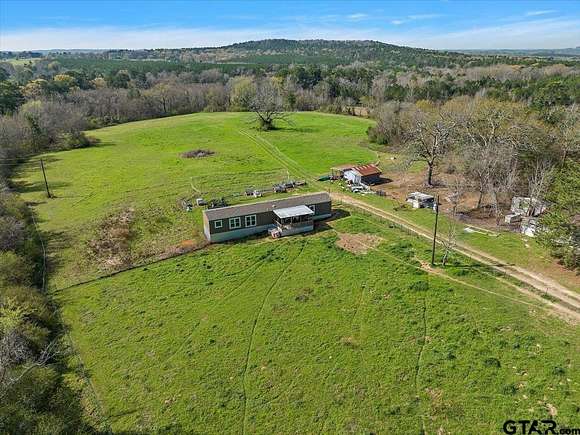 71.5 Acres of Agricultural Land with Home for Sale in Rusk, Texas