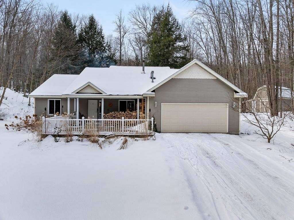 10.5 Acres of Land with Home for Sale in Charlevoix, Michigan