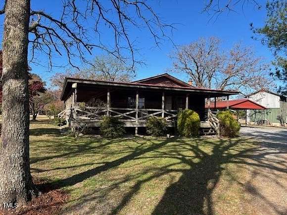 13.83 Acres of Land with Home for Sale in Benson, North Carolina