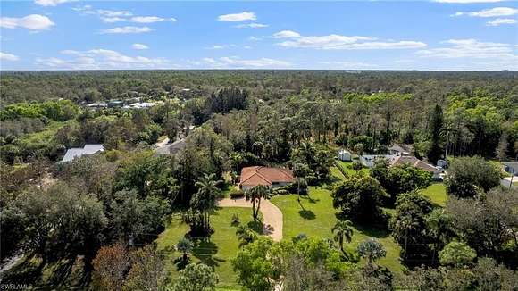 2.73 Acres of Residential Land with Home for Sale in Naples, Florida