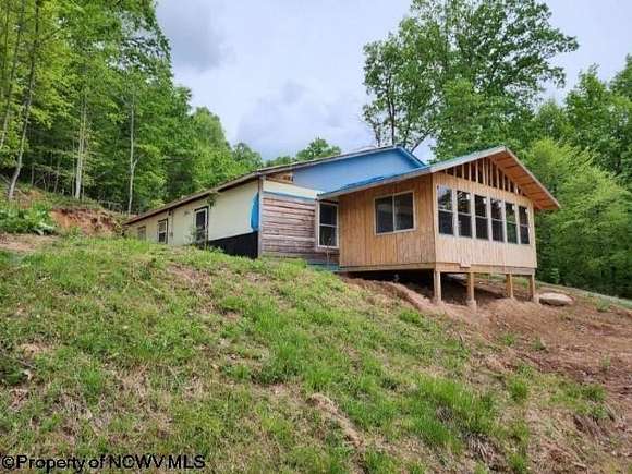 14.93 Acres of Land with Home for Sale in Horner, West Virginia