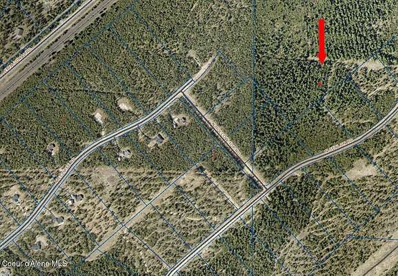 4.9 Acres of Residential Land with Home for Sale in Rathdrum, Idaho