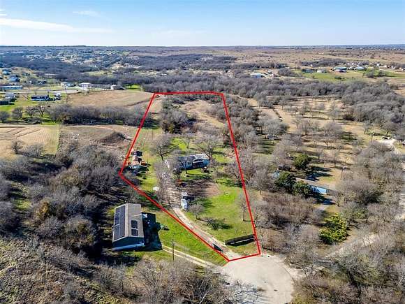 7.034 Acres of Land with Home for Sale in New Fairview, Texas