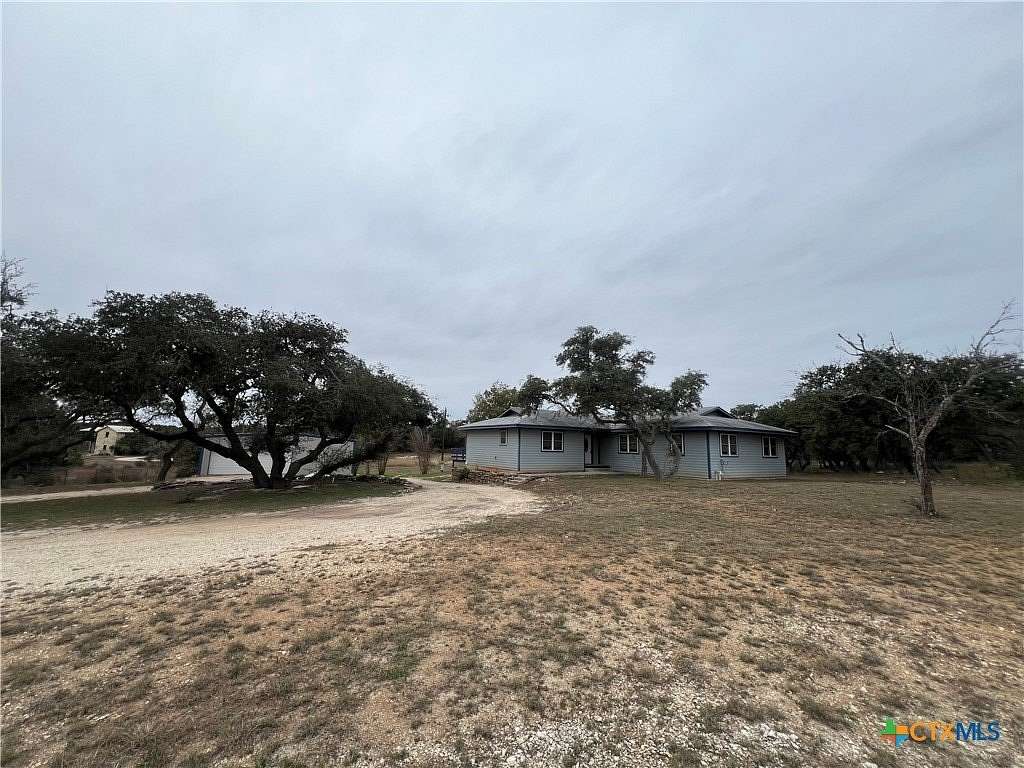 5.1 Acres of Residential Land with Home for Lease in Blanco, Texas