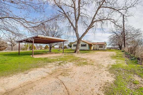 5 Acres of Land with Home for Sale in Springtown, Texas