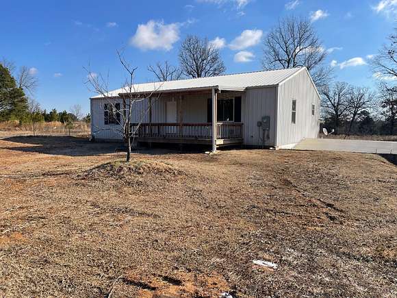 5 Acres of Residential Land with Home for Sale in Cave City, Arkansas