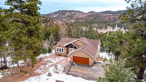 4 Acres of Residential Land with Home for Sale in Woodland Park, Colorado