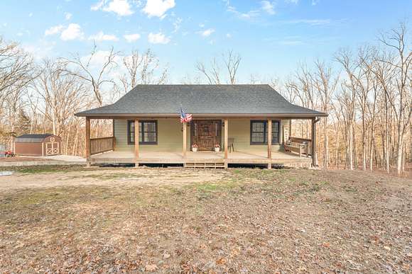 5.75 Acres of Residential Land with Home for Sale in Lampe, Missouri