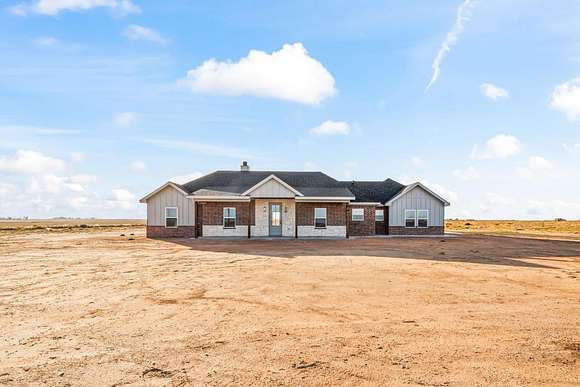 10.01 Acres of Land with Home for Sale in Slaton, Texas