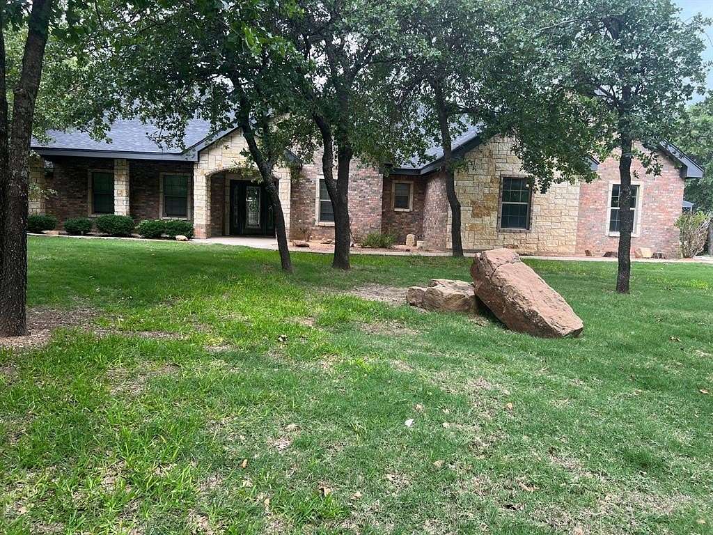 4.886 Acres of Residential Land with Home for Sale in Clyde, Texas