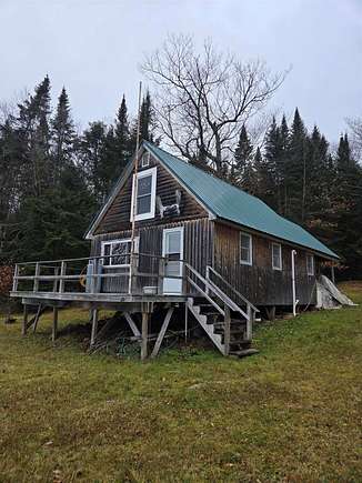 155 Acres of Recreational Land with Home for Sale in Portage Lake Town, Maine