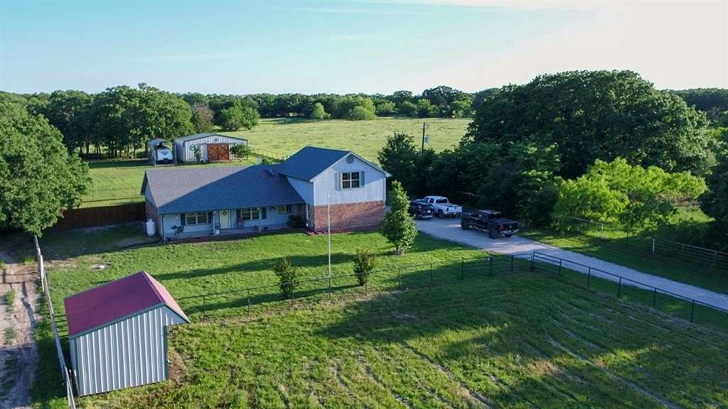 10 Acres of Land with Home for Sale in Quinlan, Texas