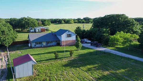 10 Acres of Land with Home for Sale in Quinlan, Texas