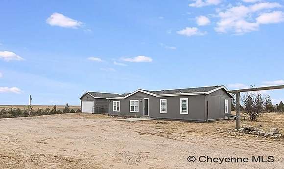 6.78 Acres of Land with Home for Sale in Burns, Wyoming