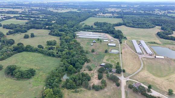 214.85 Acres of Agricultural Land with Home for Sale in Paris, Arkansas