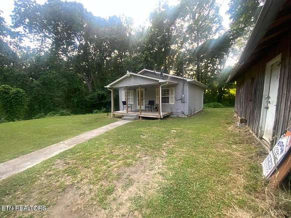 0.56 Acres of Residential Land with Home for Sale in Rocky Top, Tennessee