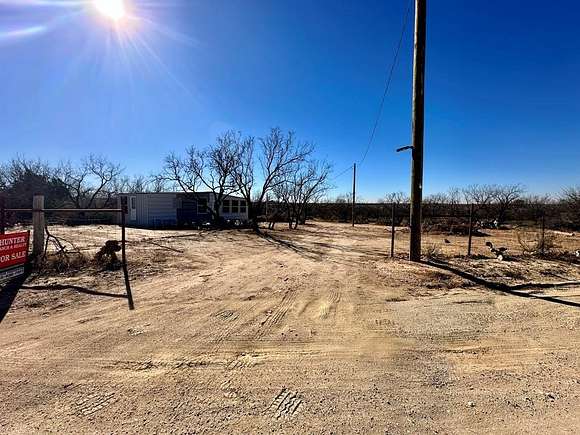 0.5 Acres of Residential Land with Home for Sale in Colorado City, Texas