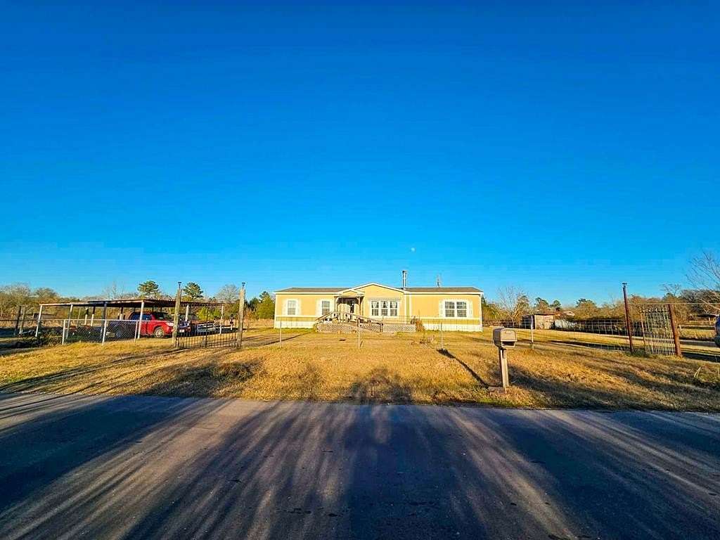 10.18 Acres of Land with Home for Sale in Elkhart, Texas