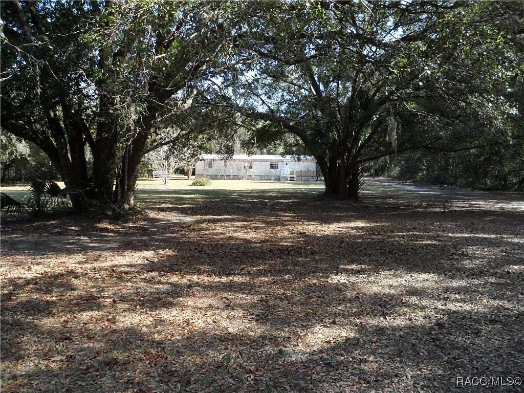 2.25 Acres of Residential Land with Home for Sale in Crystal River, Florida