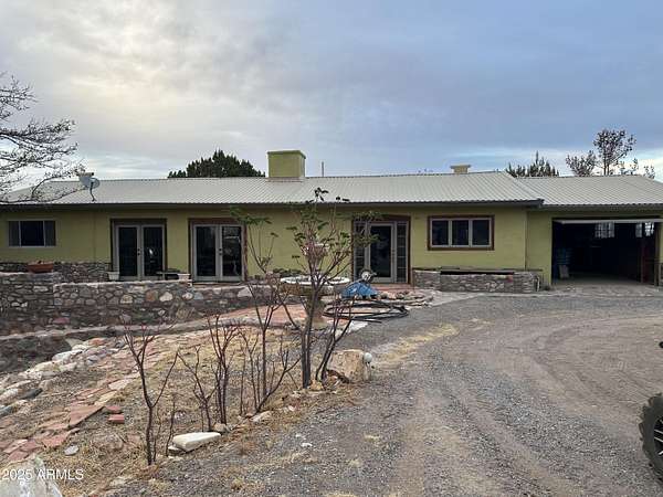 9.29 Acres of Residential Land with Home for Sale in Portal, Arizona