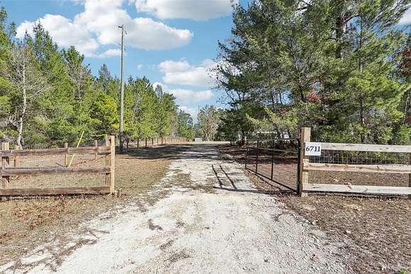 5.11 Acres of Residential Land with Home for Sale in Keystone Heights, Florida